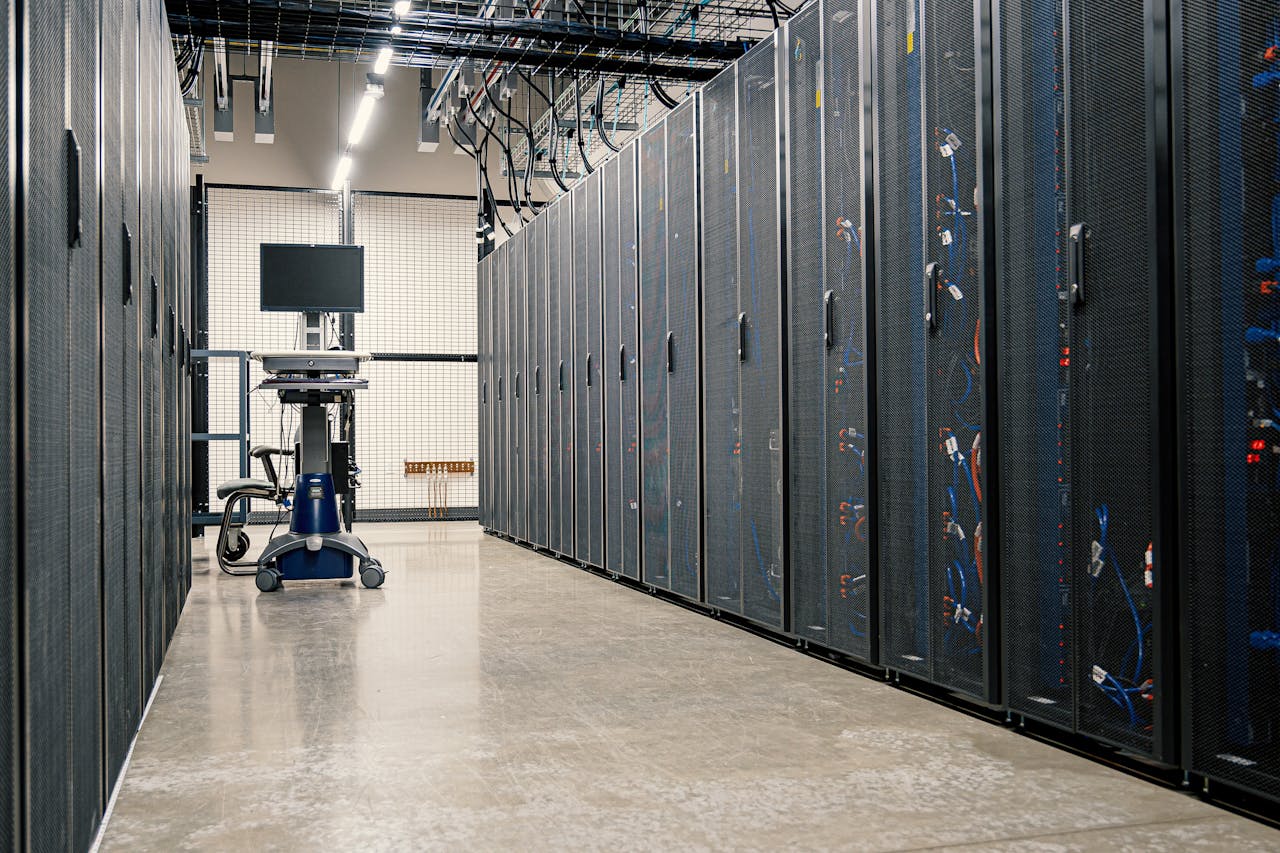 ホーム Modern data center corridor with server racks and computer equipment. Ideal for technology and IT concepts.